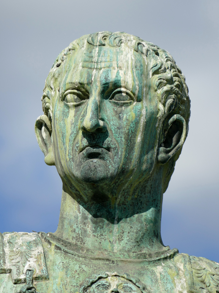 brass(?) sculpture of Caesar with discoloured green stripes