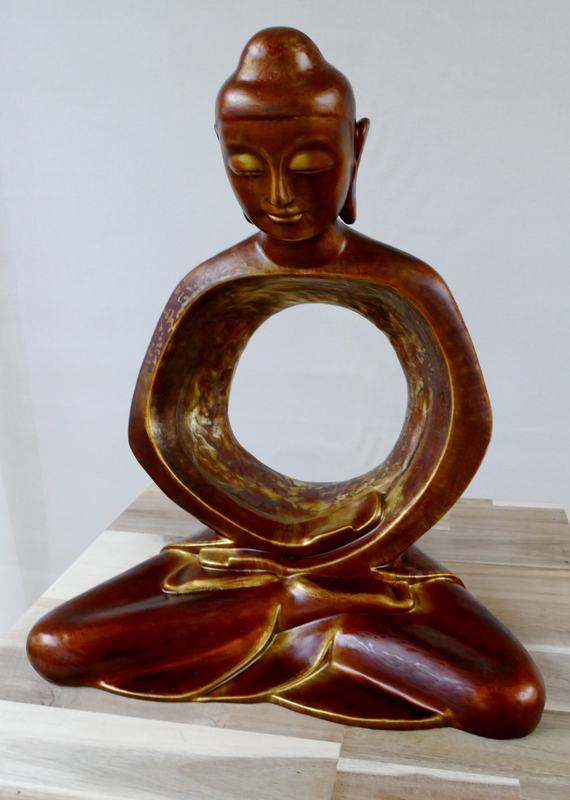 A modern, almost traditional Buddha sculpture - but the torso is entirely empty.
