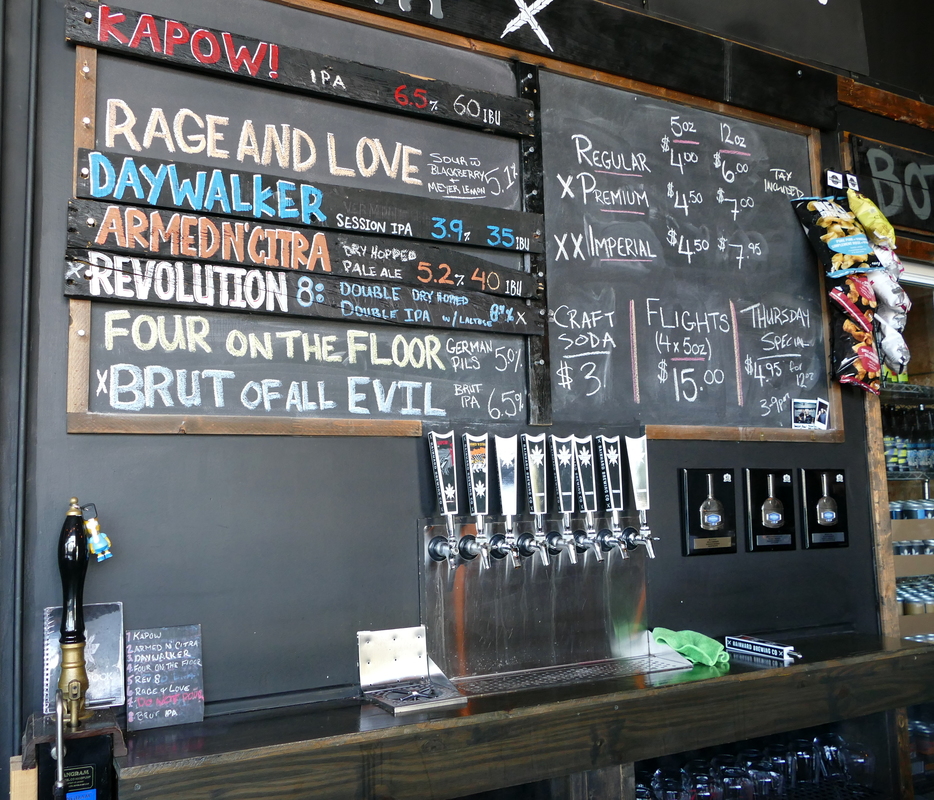 Eight taps, of which seven were active.  Hand-labeled names on a chalkboard.
