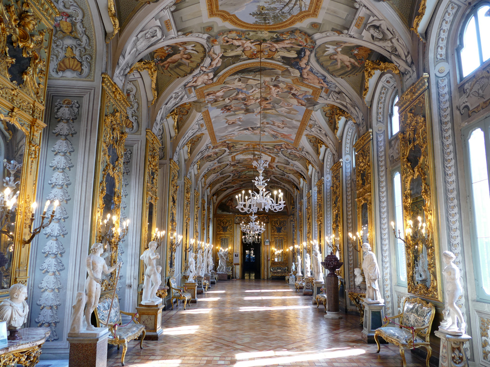 gold-leafed, windowed, and mirrored corridor lined with sculptures (and a frescoed ceiling)
