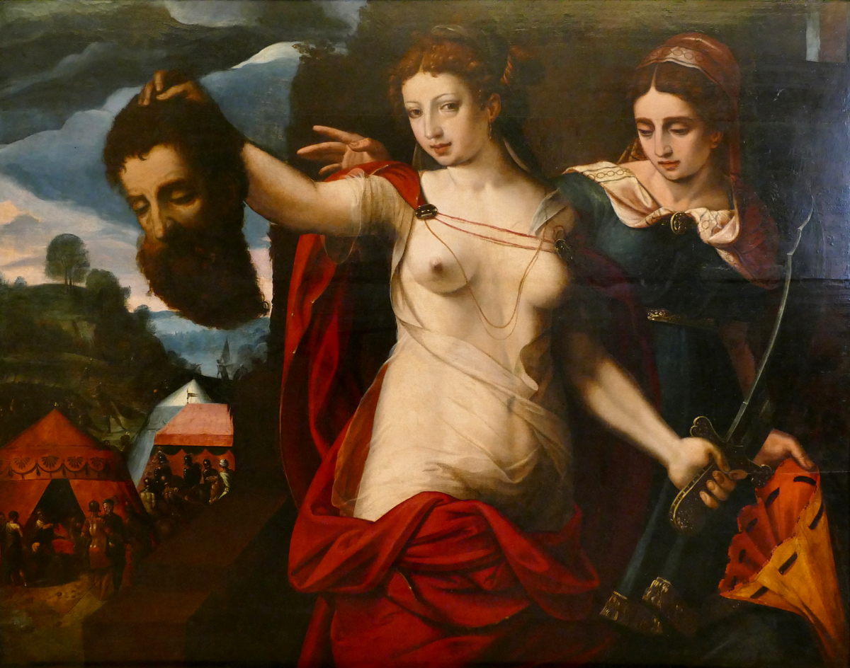 Judith, topless, holds out the severed head of Holofernes as her young servant woman looks on