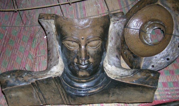 Casting casing for making Buddha images, showing the face.