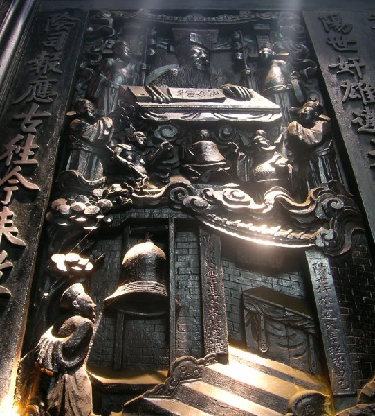 Wood carving of one of the ten hells